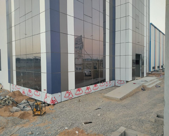 ACP cladding and curtain wall glazing on a UAE building
